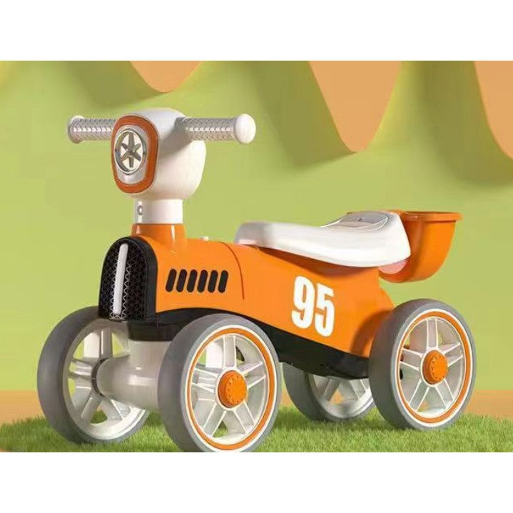 Bicicleta fara pedale pentru copii, cu lumini si muzica, 4 roti, varsta 1-3 ani, material PP, 63 x24 x41 cm, portocaliu