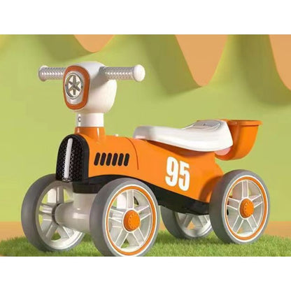 Bicicleta fara pedale pentru copii, cu lumini si muzica, 4 roti, varsta 1-3 ani, material PP, 63 x24 x41 cm, portocaliu