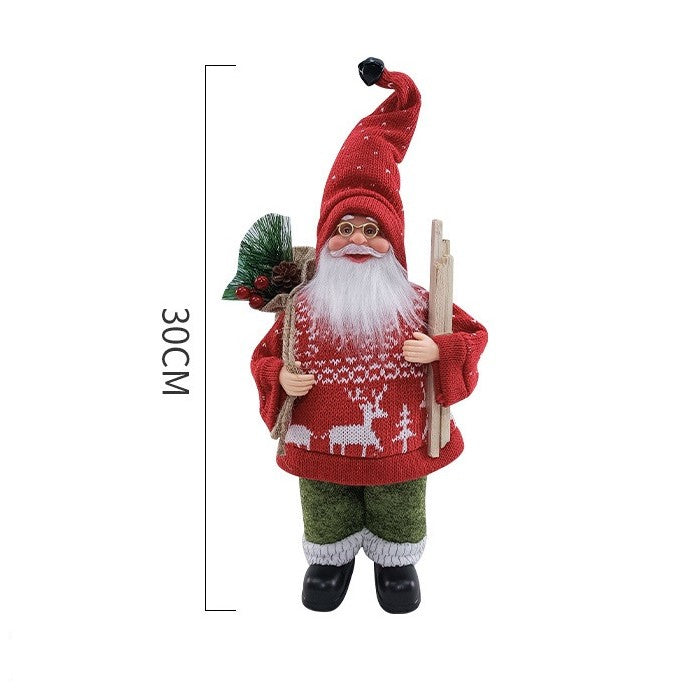 Figurina Decorativa Craciun, Mos Craciun cu Lemne la Brat, 30 x 17 x 10 cm, Material Plastic+Textil, Interior/Exterior, Rosu/Verde