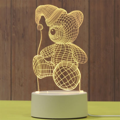 Lampa LED decorativa, 3D, Urs cu palarie, cu telecomanda, doua moduri de alimentare USB si baterii, 20 cm inaltime, din material acril si lumina multicolora, alb