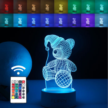 Lampa LED decorativa, 3D, Urs cu palarie, cu telecomanda, doua moduri de alimentare USB si baterii, 20 cm inaltime, din material acril si lumina multicolora, alb
